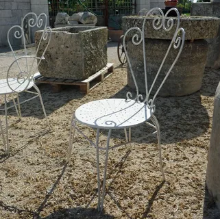 Mobilier de jardin en teck et fer forgé